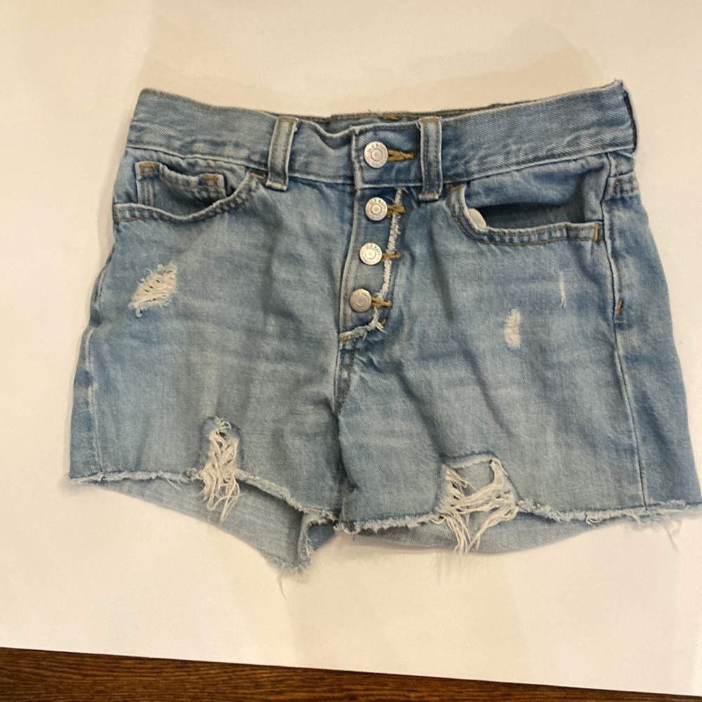 Old Navy High wasted denim jean short with rips it is a size 12 in kids